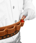 Man inserting shells into Rugged Cowhide Leather Shotgun Shell Bandolier Belt For 12 Gauge And 16 Gauge Ammo Built Tough With Handbraid Detailing
