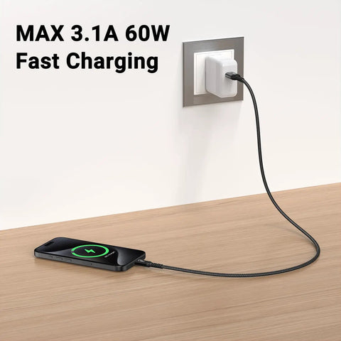 USB C Car Cable For Android Auto And CarPlay, 10Gbps USB 3.1 Gen 2, One And A Half Foot, Two Pack, Black, Plug And Play In Car Data Sync Cable For IPhone 15 Series And Android Phones. Black USB-C cable charging a phone at a wall outlet