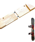 Sturdy Solid Wood Snowboard Rack Wall Mount For Home Or Garage Featuring Adjustable Width And Tight Grip Supports Holding Up To Thirty Pounds Hella Smooth Gear Storage with snowboard attached.