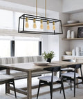 5 Light Modern Farmhouse Kitchen Island Chandelier With Black Brass Industrial Vibe For Kitchen Island And Living Room Open Geometric Frame With Matte Black Brass Finish Dining Room Fixture hanging over dining table.