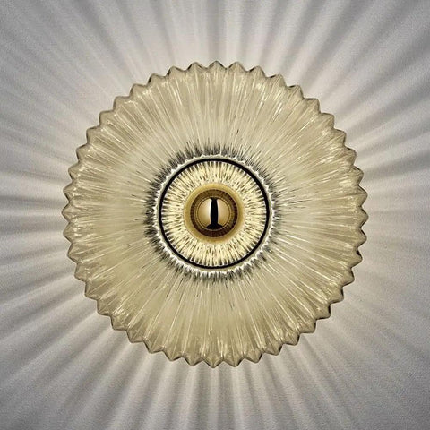 Awsinil Fluted Glass Wall Sconce, Modern Iron Round Decorative Wall Light with ribbed glass and soft radiating light effect.
