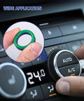 Close-up of hand holding green O-ring with car AC control, All In One 612 Piece Automotive O Ring Kit For Air Conditioning And Plumbing