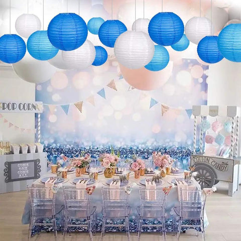 Blue Paper Lanterns Set Of 12 Assorted Sizes 6 Inch 8 Inch 10 Inch And 12 Inch Chinese Round Hanging Lamps over party table