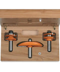 Pro Tool Belt Essential Ogee Router Bit Set With Anti Kickback Design And Nonstick Shield Coating in wooden storage box.