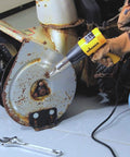 Using Dual Temp Heat Gun Kit with 750 Degrees F and 1000 Degrees F on rusted bolt, ideal for DIY home projects.