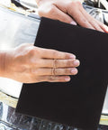Top Notch Wet And Dry Sandpaper Assortment Pack With 60 To 320 Grit Sheets in use on an auto surface for polishing.
