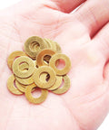 EDC Pocket Knife Brass Washer Gasket Replacement Set For C81 C223 C85 Pivot Pin Washers in hand view, 0.3x11x5.2mm, Pack of 20 Pieces