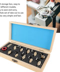 Mainspring Winder Set For Watch Repair Brass Tool Kit With Storage Box, showing organized brass tools in wooden case
