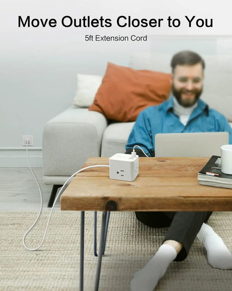 Ultra Compact Six Outlet Surge Protector With Three AC Outlets And Three USB Ports on a wooden table