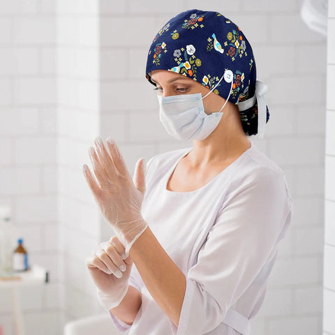Nurse wearing floral 8 Pack Women's Scrub Caps With Buttons In Eight Different Patterns Adjustable Bouffant Surgical Hat with gloves