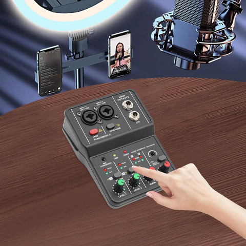 User operating Two Channel DJ Mixer For Laptop Tablet And Phone With 16Bit 48KHz Audio Resolution Portable Pro Mixing Console