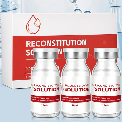 Front view of three 10 mL clear glass reconstitution solution vials with silver caps beside a white and red box.