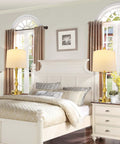 Bedroom scene with Set Of 2 Touch Control Table Lamps With USB Charging Ports, 3 Way Dimmable, Modern Nickel And Gold Finish, White Fabric Drum Shades on nightstands