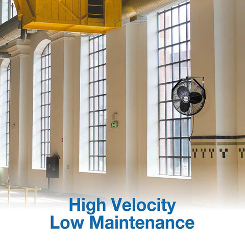 18 Inch Industrial Wall Mount Fan With Pivoting Head For Directional Airflow One Sixth Horsepower Powder Coated Steel Black installed in workshop.