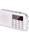 White Tiny But Mighty Ultra Compact AM FM Pocket Radio With MP3 Player LED Flashlight And Micro SD TF Card USB Support Auto Scan Save 1200mAh Rechargeable Battery Operated Latest Version displaying 106.2 FM with keypad
