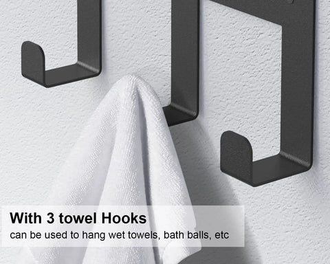 Close-up of Compact Bathroom Towel Rack With Shelf And Three Hooks, black hooks holding a white towel, wall mounted