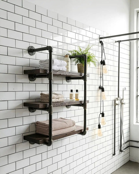 Wall-mounted shelves using Ten Pack Three Quarters Inch By Two Inches Black Malleable Iron Pipe Nipples Fitting With Threaded Ends for industrial decor