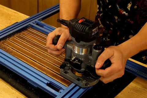 Heavy Duty Adjustable Juice Groove Routing Jig Built From Tough Anodized Aluminum With Secure Hold Downs And Precision Centering Blocks in use.