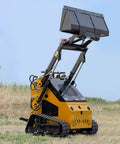 Mini Triangular Track Skid Steer Loader With 23HP Gas Engine And 46 Inch Bucket Stand On Crawler lifting bucket in a field