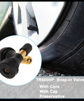 Close-up of TR600HP snap-in tire valve stem with brass core, black rubber body, and cap