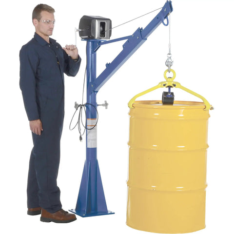 No Sweat Industrial Workhorse 115V AC Jib And Davit Crane With 1500 Lb Capacity lifting a yellow barrel with a man beside it.