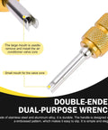 Close-up of a dual-ended wrench from the 16 Piece Air Conditioning Valve Core Kit For R12 And R134a Systems showing tool details.