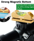 Qpong scope leveling kit installed on rifle scope; gold aluminum body with bubble level and magnetic bottom.
