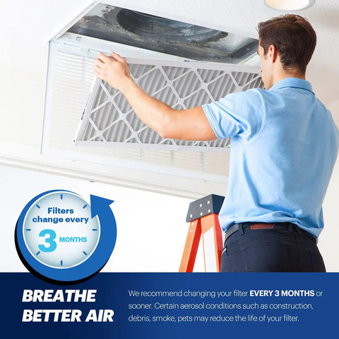 Man installing Top Rated 20x20x1 MERV 13 Electrostatic Pleated Air Filter For AC, Furnace And HVAC, 4 Pack, Made In USA in ceiling vent