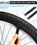 Hand using lever on 24x1.95 Mountain Bike Tire And Tube Set With Schrader Valve Includes 2 Tire Levers Compatible With 24 Inch MTB BMX Off Road Bikes Fits 24x1.75 1.95 2.0 2.10 2.125 Tires Durable Puncture-Proof Tire Kit.