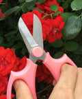 Pro Grade Garden Pruning Scissors With Comfort Grip Handle Set Razor Sharp SK5 Stainless Steel Floral Scissors close-up on red roses