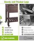 Close-up of brown elevated raised garden bed with sturdy legs, wheels, and multiple planter boxes for growing plants.