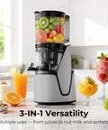 EanOruus 3-in-1 Cold Press Juicer With Huge 6.5 Inch Wide Chute And 100 Oz Tank for fresh juice, nut milk, and sorbet.
