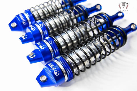 Blue Aluminum BigBore Shocks For 4x4 And 2WD Trucks And SUVs Front And Rear Adjustable shimmering springs on white background