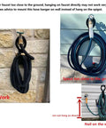 Beefy Heavy Duty Garden Hose Holder For 50Ft And 25Ft Expandable Hose mounted on wall, showing proper usage and placement.