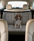 Heavy Duty Mesh Pet Gate For Tesla Cybertruck locks down rear space; mesh divider keeps a dog seated in the back seat.