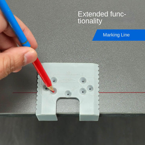 Hand using a pencil with Door Hinge Router Jig With Adjustable Mortise Guide And 2mm Precision Groove on a surface for marking