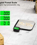 Beefy 440Lb Postal Scale with Stainless Steel Platform, tare hold, and counting functions on a warehouse floor with parcels.