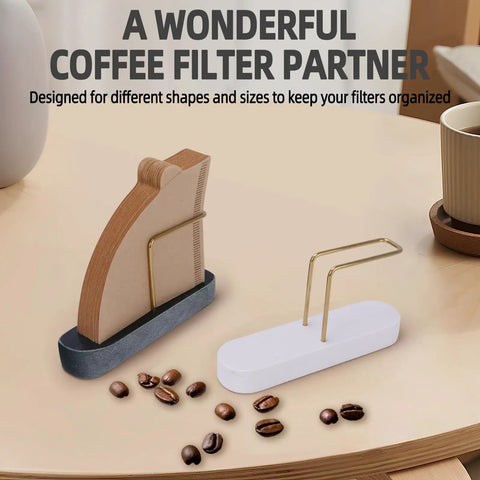 Marble And Brass Cone Coffee Filter Holder Stand For V60 Filters Size 01 02 04 on a table with coffee beans.