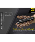 MH12V2 Plus NL2150 1200 Lumen USB Rechargeable Tactical Flashlight held on camo gloves showing grip and compact design