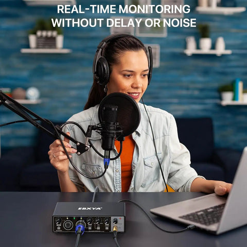 Person using 2x2 USB Audio Interface For Recording Music, 24 Bit 192 KHz, No Fuss Plug And Play For PC And Mac; podcast setup