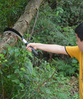 Person using Heavy Duty Billhook Sickle Machete With Aluminum Handle And Carbon Steel Blade For Grass Cutting Farm Work Harvesting Weeding