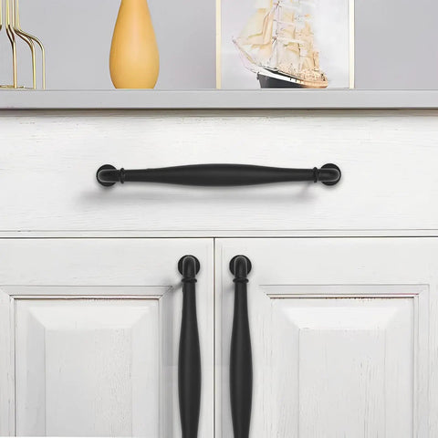 10 Pack Kick-Ass Black Cabinet Pulls With Real Deal Heavy-Duty Build And Super Smooth Finish Perfect For Dressers Bathrooms And Closets Featuring 5 Inch Hole Centers on white cabinet.