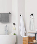 Industrial Style 10 Piece Bathroom Hardware Set Boss Black Finish with towel bars, towel ring, and robe hook on bathroom wall.