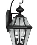 Outdoor Wall Lantern In Classic Traditional Style With Clear Beveled Glass Shades Black Finish Handcrafted Solid Brass Construction