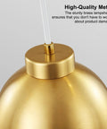 Close-up of IPEDWO 2-Light Modern Gold Pendant Lights showing brass lampshade and adjustable cable for kitchen island.
