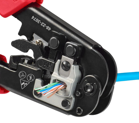 Close-up of the Badass Heavy Duty Wire Stripper With Auto Ratcheting Crimping Tool 48-22-3074 crimping wires.