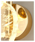 Close-up of Modern LED Wall Sconce With Crystal Accent For Bedroom And Bathroom Easy Quick Install showing gold finish and clear glass trim.