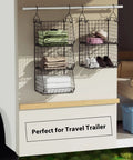 Dead Simple Hanging Closet Organizer With Expansive Tiered Wire Baskets Saves Serious Space In Your Laundry Room Keeps Sweaters Jeans And Scarves Tidy As A Whistle With No Sweat Setup in travel trailer with folded towels.