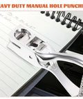 Compact Manual Oval Hole Puncher For IDs And Office Paper, Rugged Metal Single Hole Punch Tool next to spiral notebook
