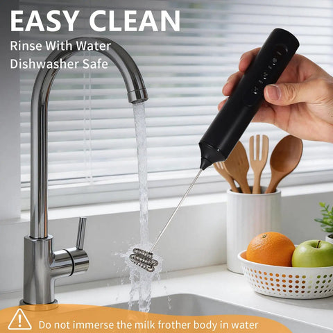 Rinsing Rechargeable Handheld Milk Frother With Stand 3 Speeds And 3 Detachable Stainless Steel Whisks under a faucet